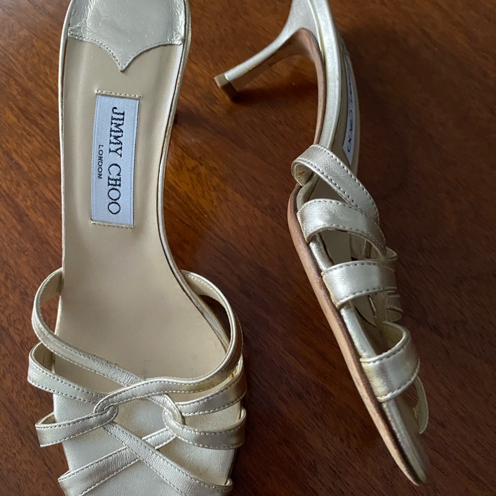Jimmy Choo Sexy gold heels. Flattering and a statement shoe.